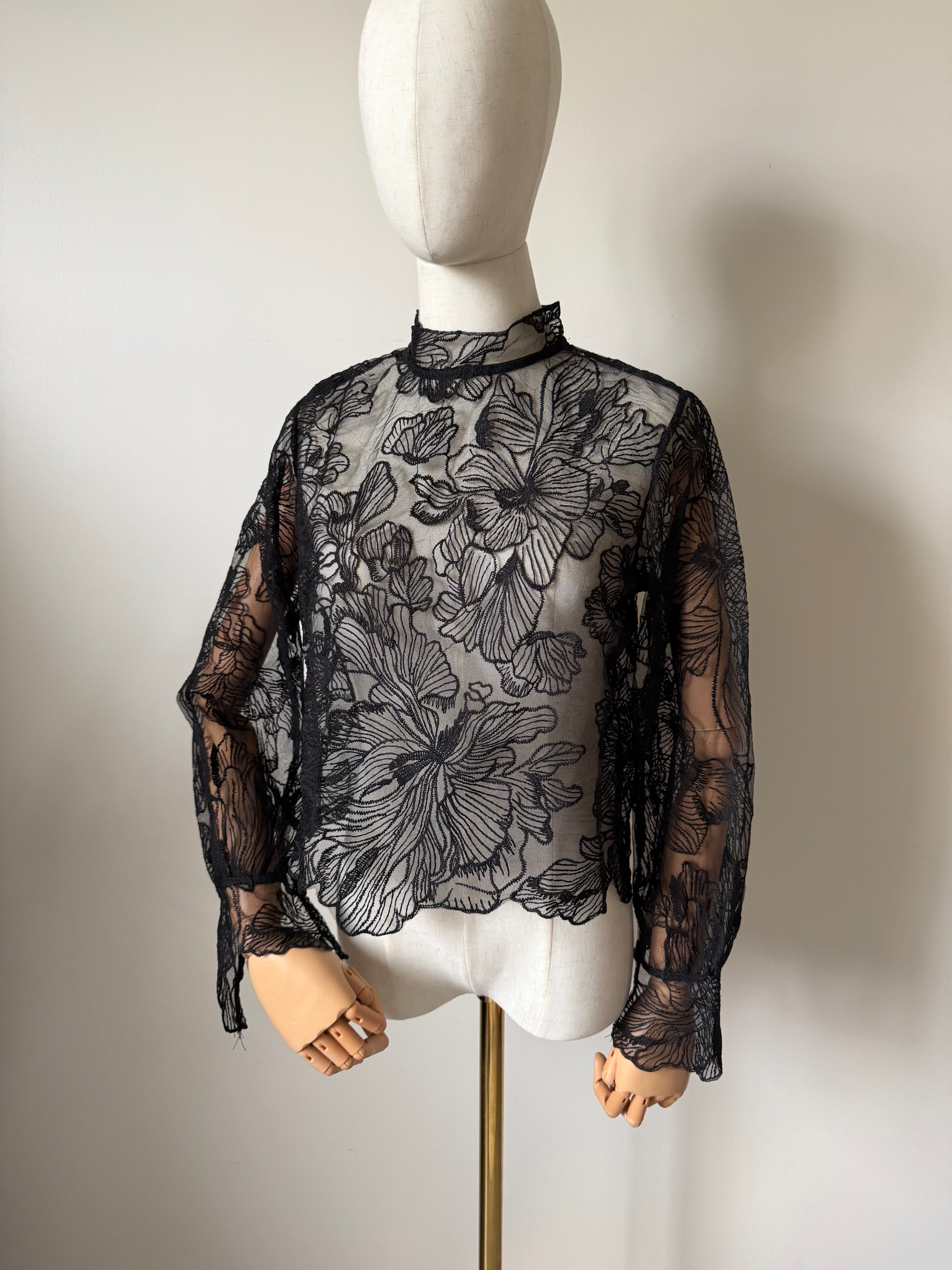 Long-sleeved lace top with open back
