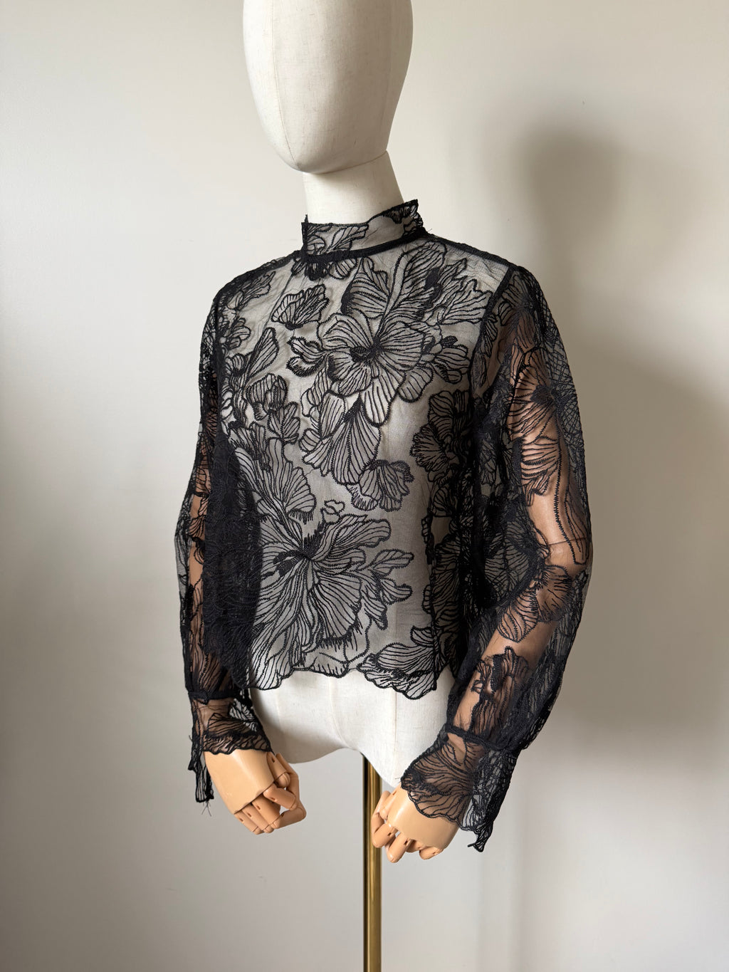 Long-sleeved lace top with open back