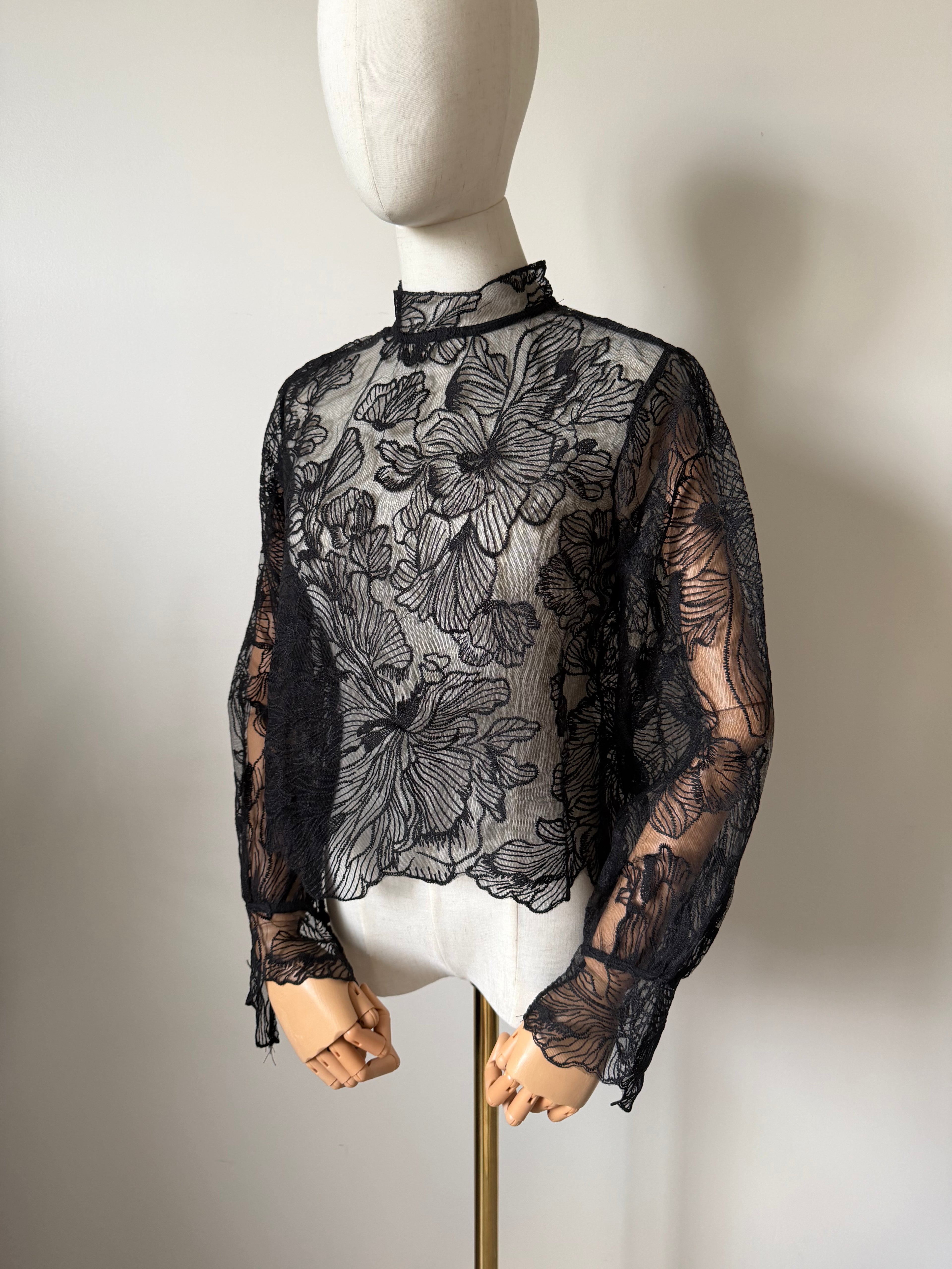 Long-sleeved lace top with open back