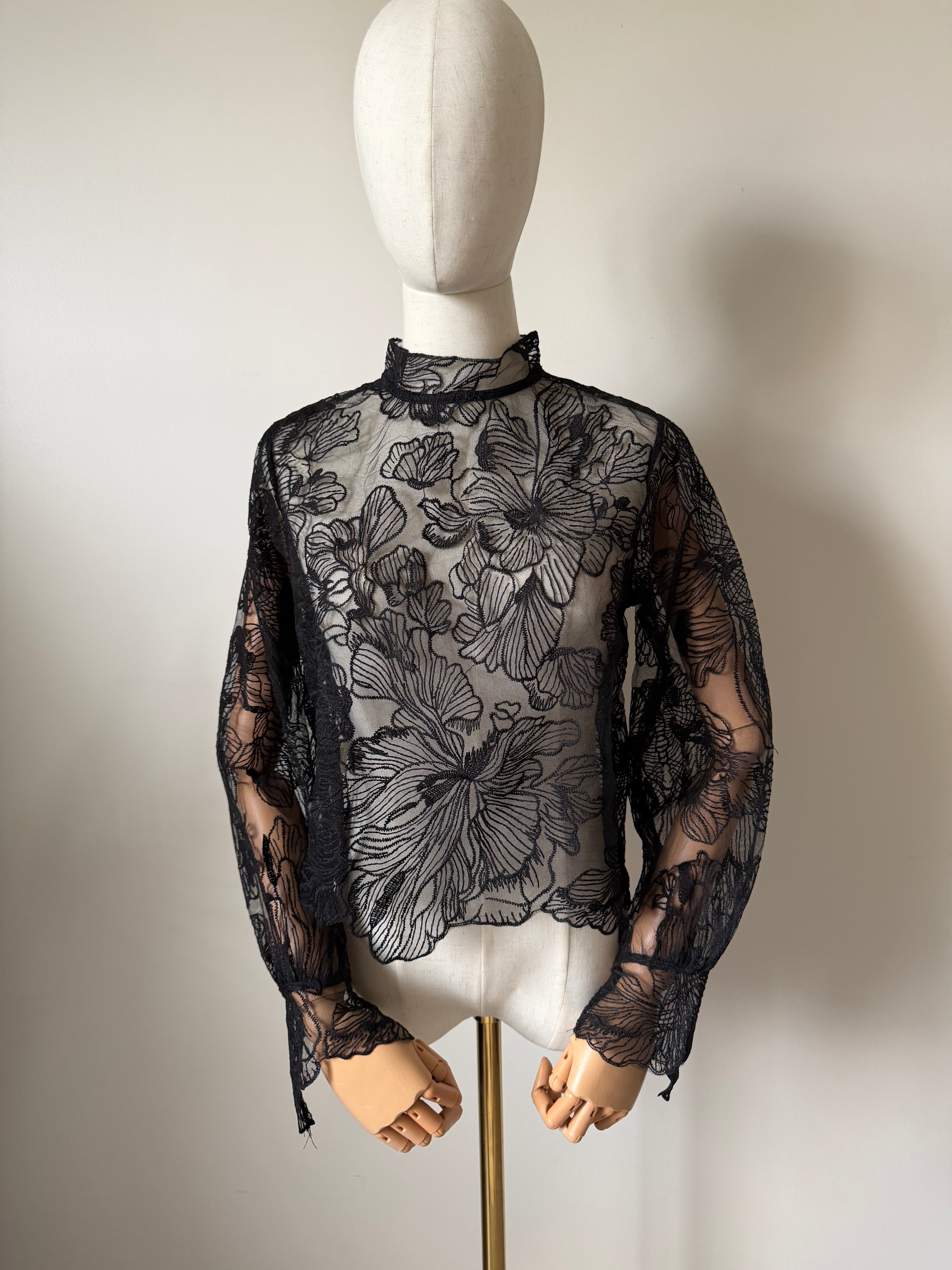 Long-sleeved lace top with open back