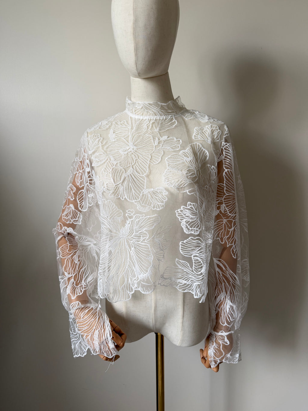 Long-sleeved lace top with open back