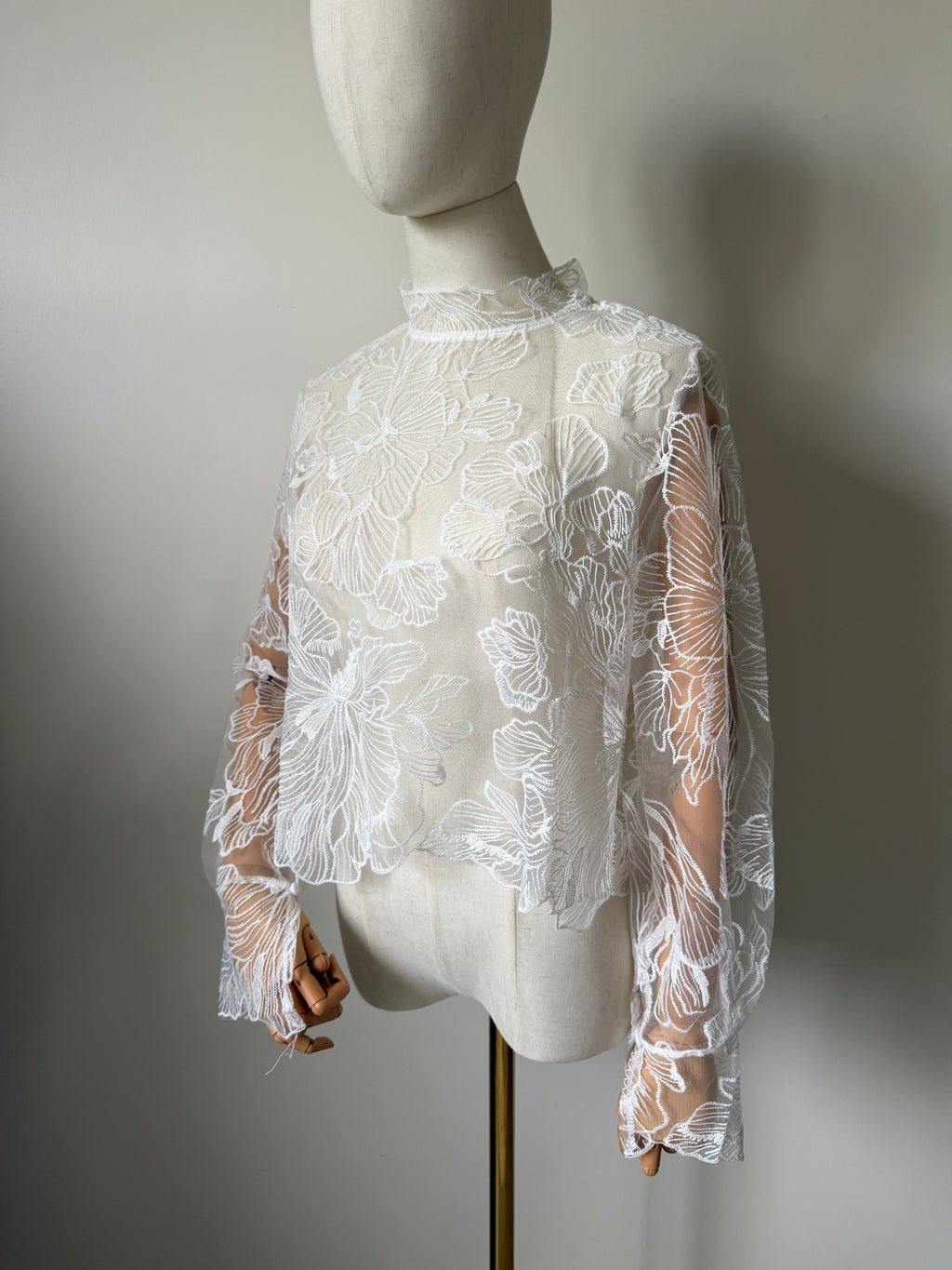 Long-sleeved lace top with open back