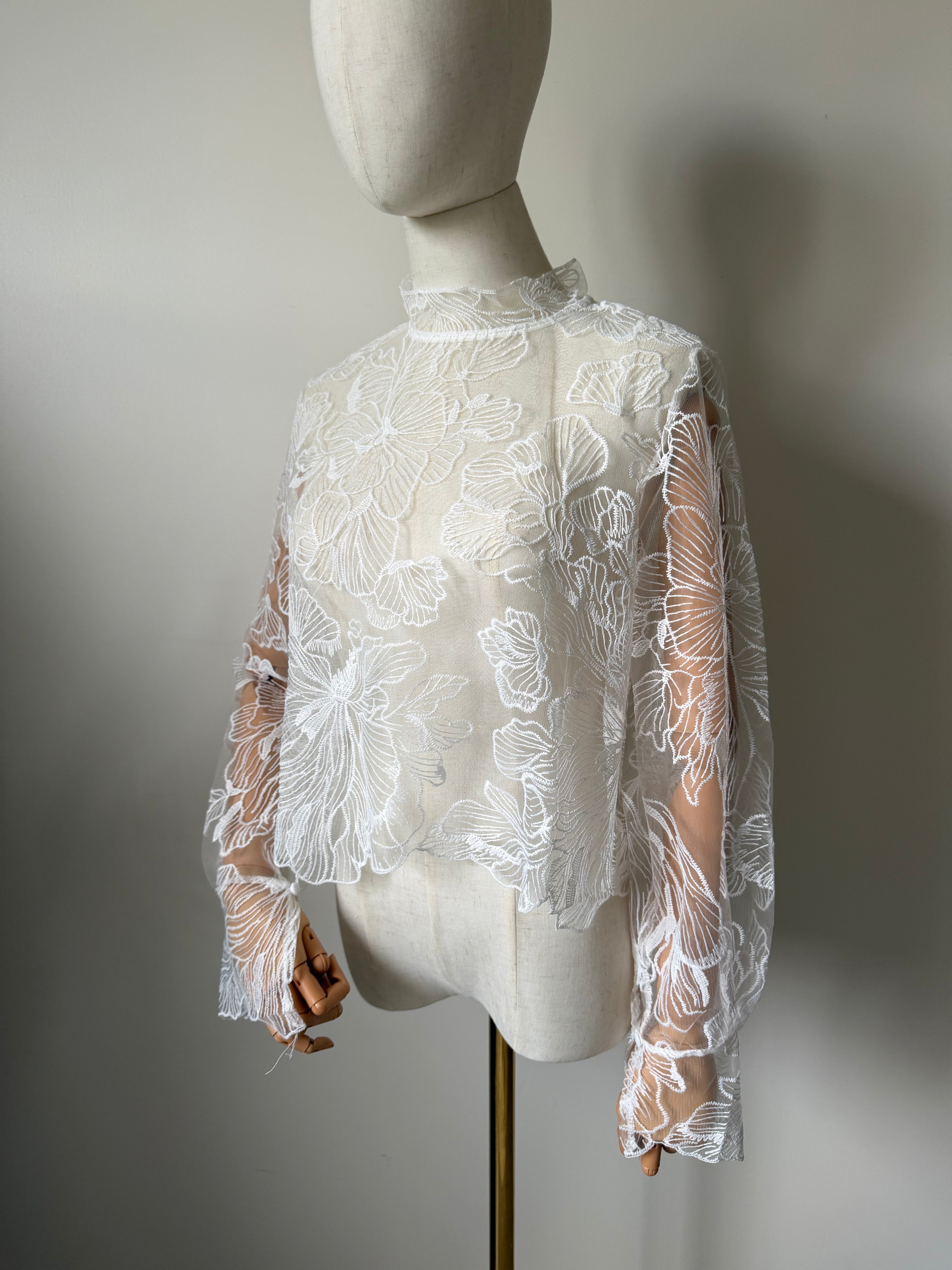 Long-sleeved lace top with open back