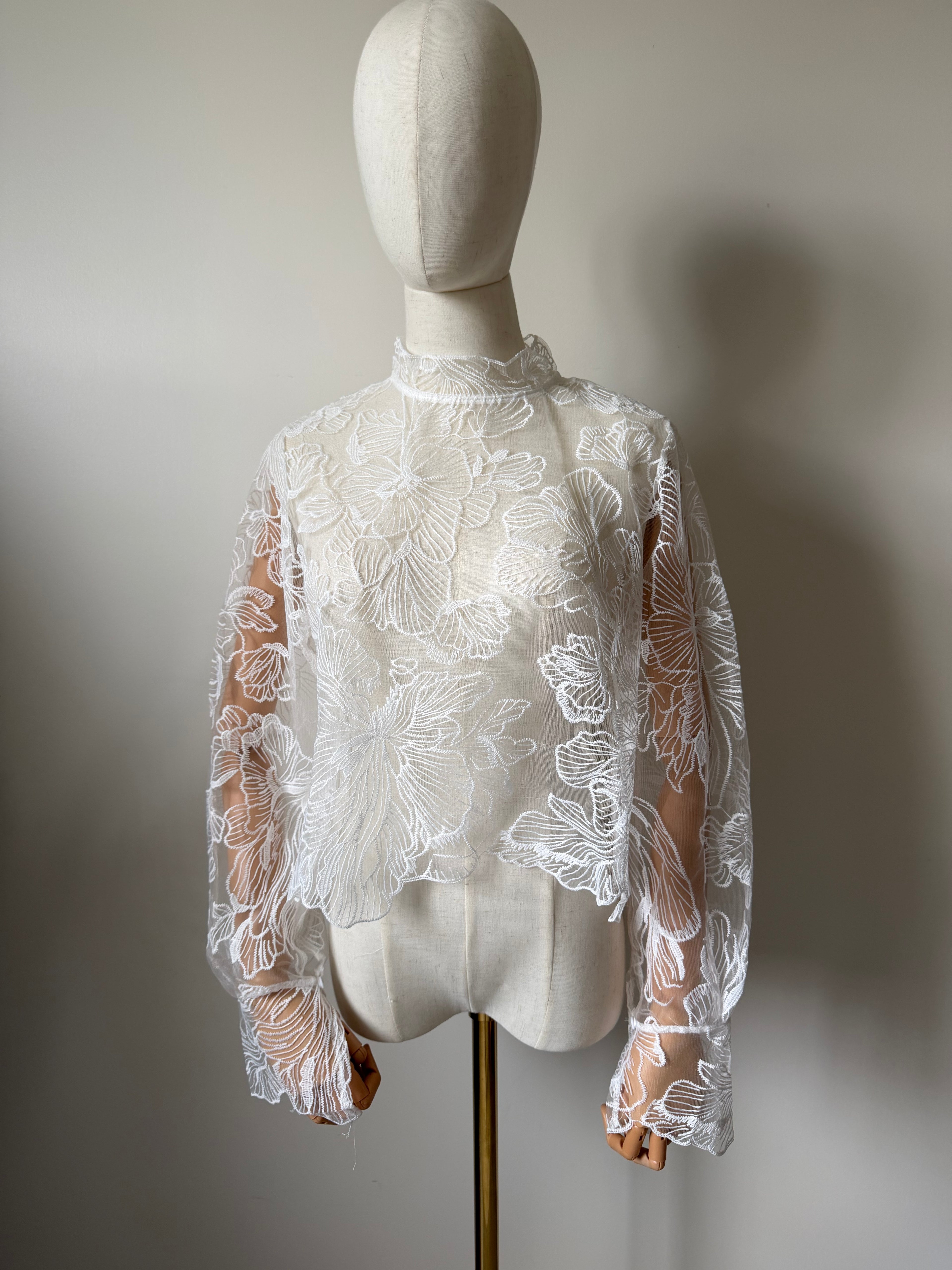 Long-sleeved lace top with open back