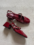 Patent slingback heels