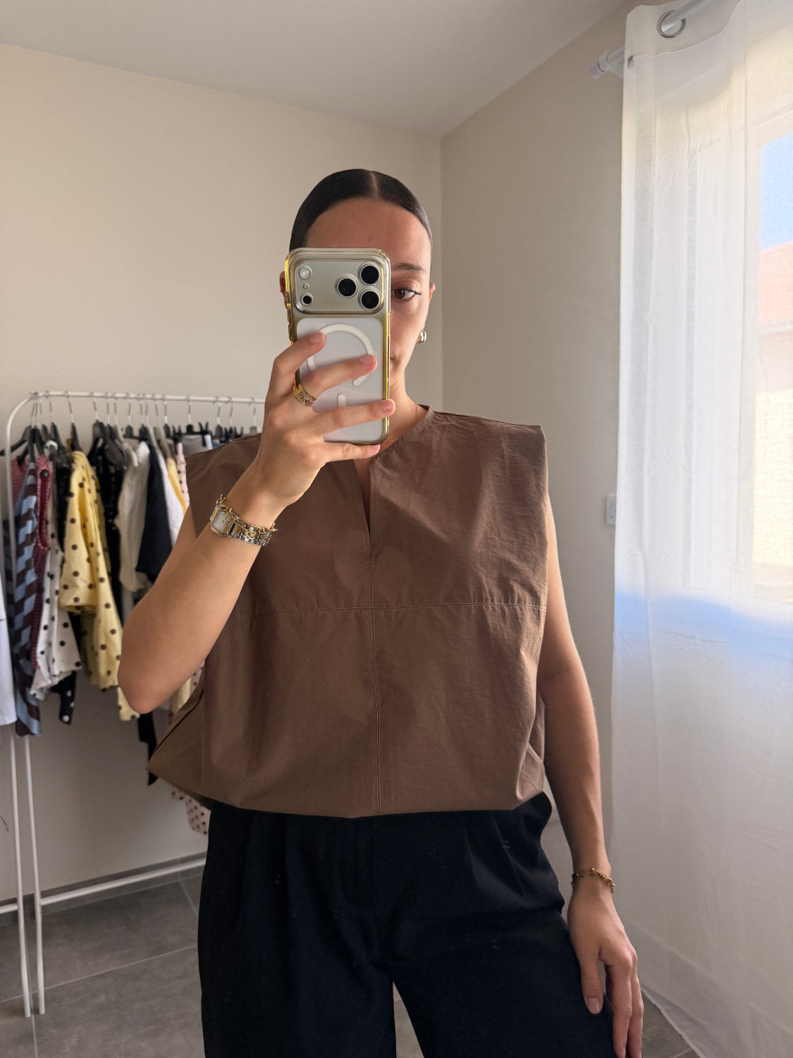 Blouse sans manches coupe large et petit col V