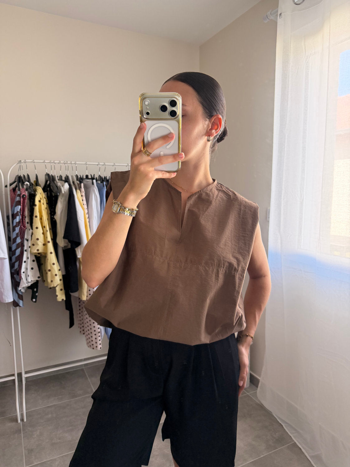 Blouse sans manches coupe large et petit col V