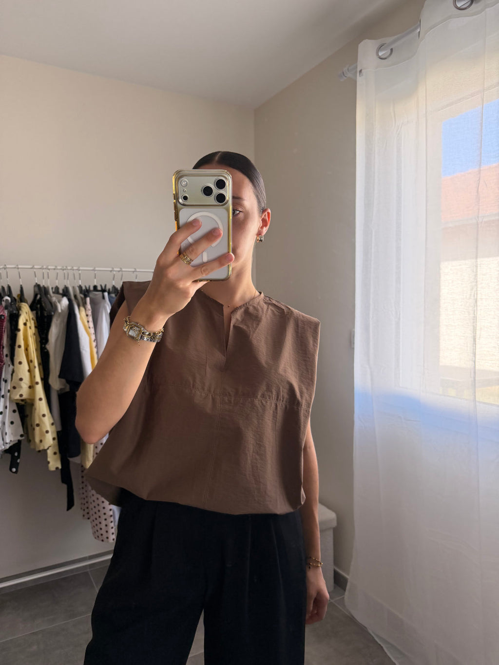 Blouse sans manches coupe large et petit col V