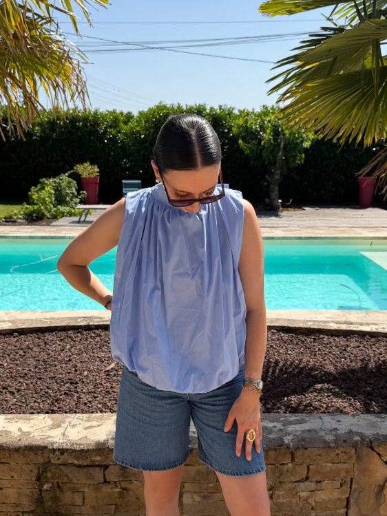 Blouse sans manches dos ouvert avec noeud