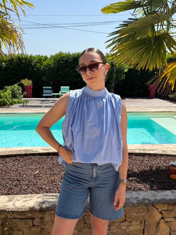 Blouse sans manches dos ouvert avec noeud