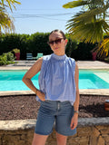 Blouse sans manches dos ouvert avec noeud