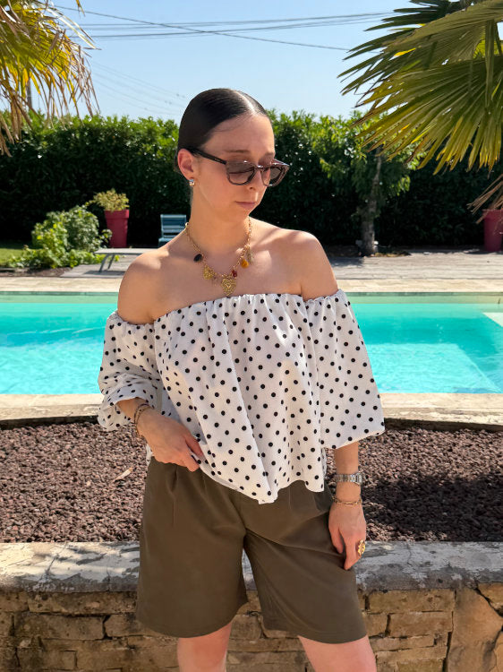 Blouse manches bouffantes à pois noirs