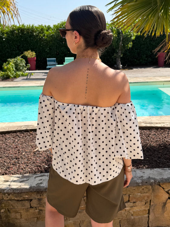 Blouse manches bouffantes à pois noirs