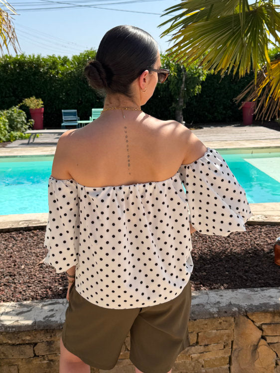 Blouse manches bouffantes à pois noirs