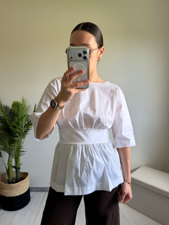 Blouse manches courtes avec nœud dans le bas du dos