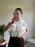 Blouse sans manches effet ruché dos nu