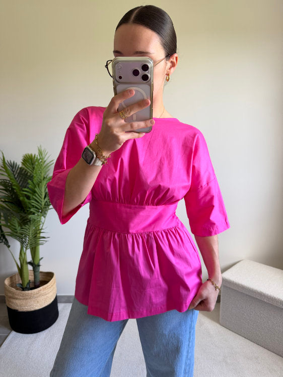 Blouse manches courtes avec nœud dans le bas du dos