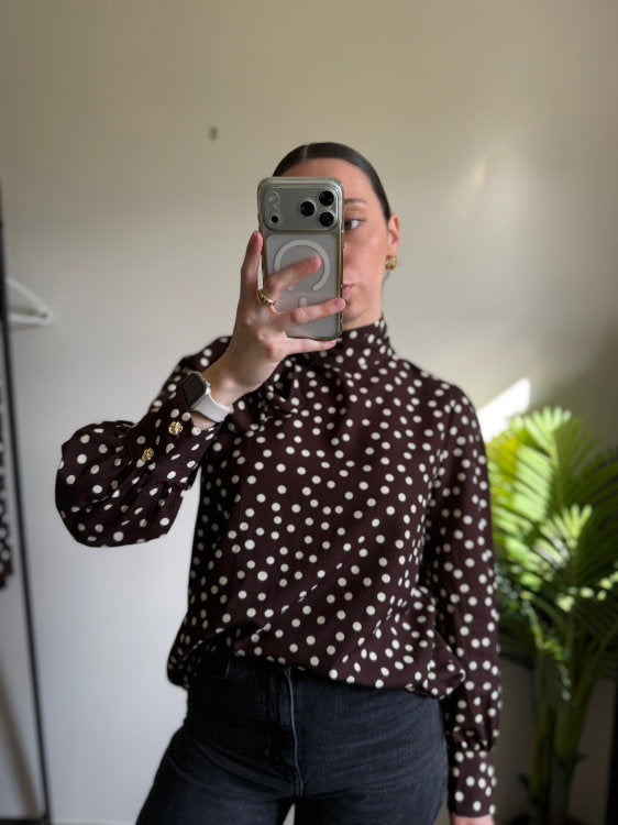 Blouse manches longues à pois blancs avec noeud