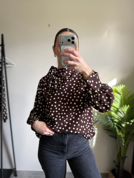 Blouse manches longues à pois blancs avec noeud