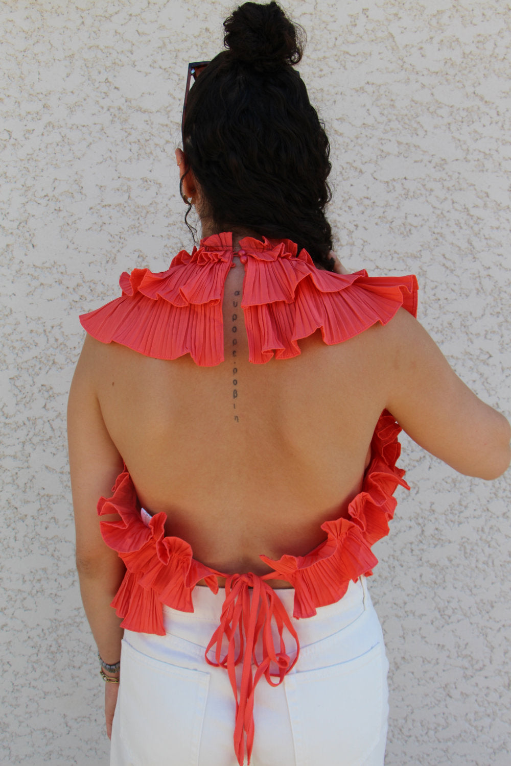 Blouse sans manches effet ruché dos nu