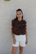 Blouse sans manches avec pois blancs effet ruché dos nu
