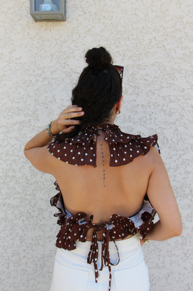 Blouse sans manches avec pois blancs effet ruché dos nu