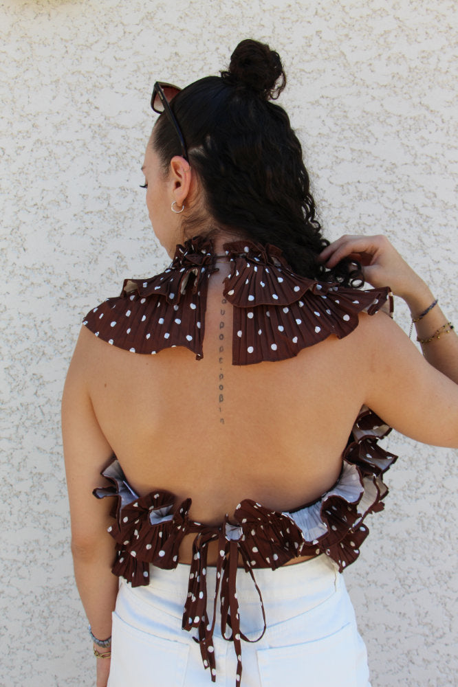 Blouse sans manches avec pois blancs effet ruché dos nu