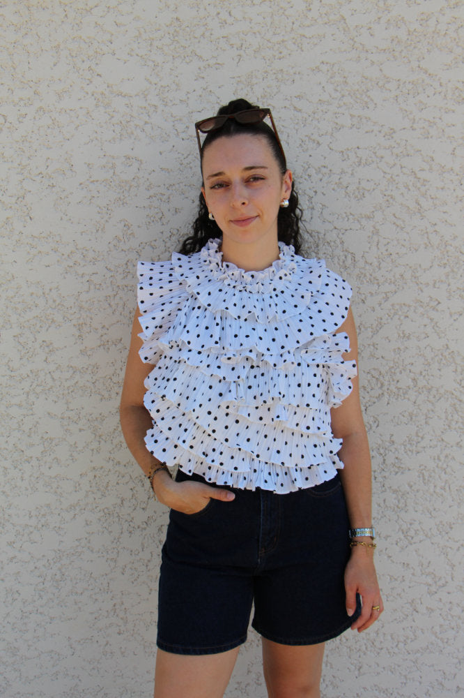 Blouse sans manches avec pois noirs effet ruché dos nu