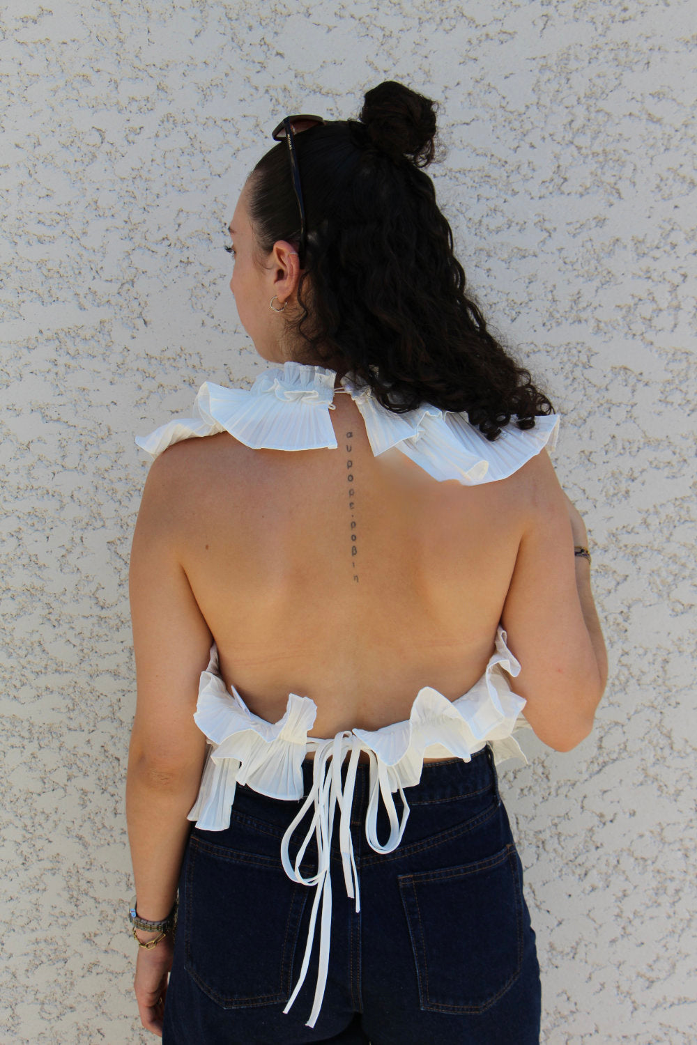 Blouse sans manches effet ruché dos nu