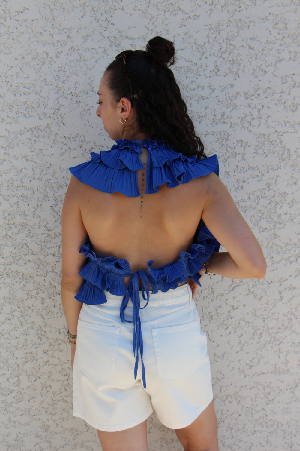 Blouse sans manches effet ruché dos nu