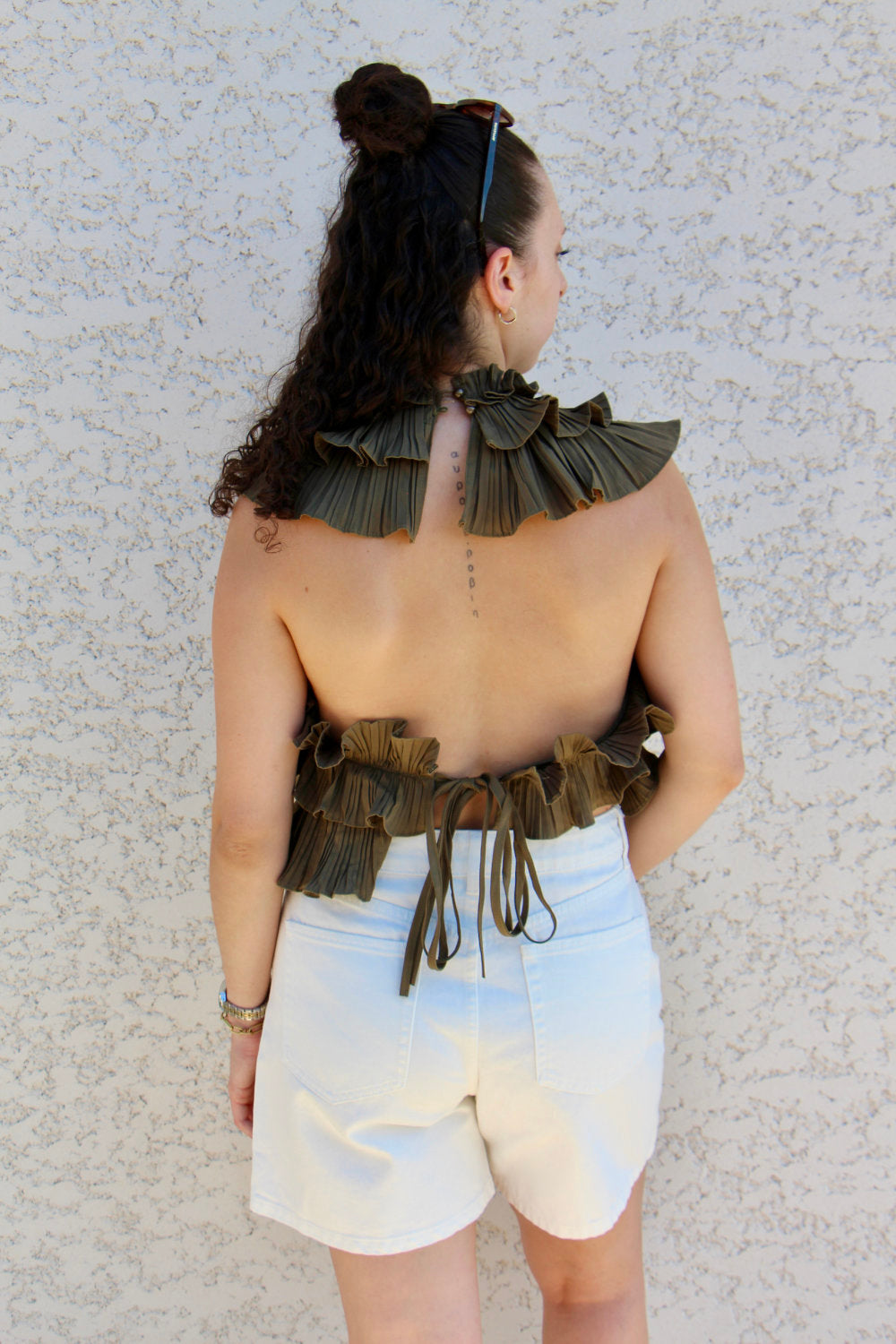 Blouse sans manches effet ruché dos nu